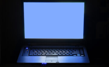 Laptop notebook computer open screen top  illuminated at night